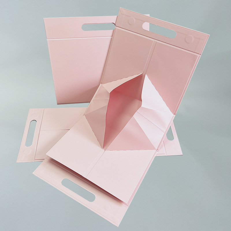 lat-pack structure of a triangular rigid box showing the collapsible design for shipping.