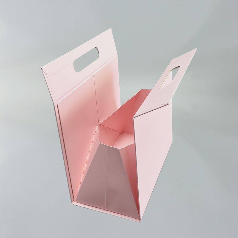 Internal view of a custom pink triangle foldable gift box for luxury cosmetics.