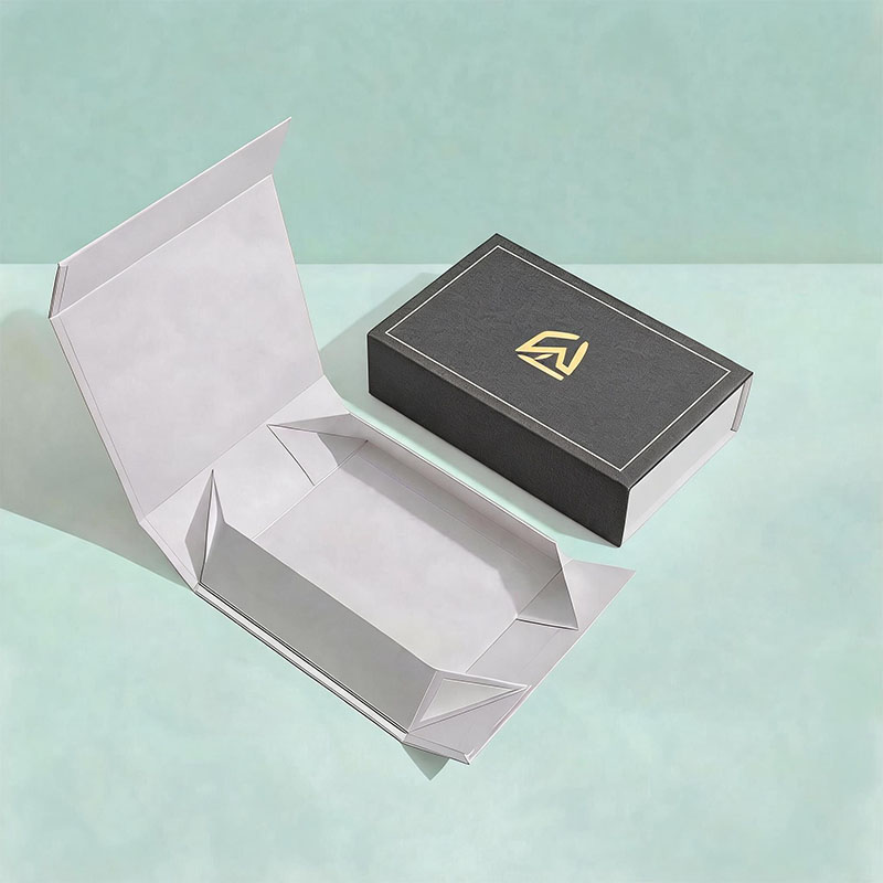 Wholesale black collapsible shoe packaging box with custom gold foil logo.